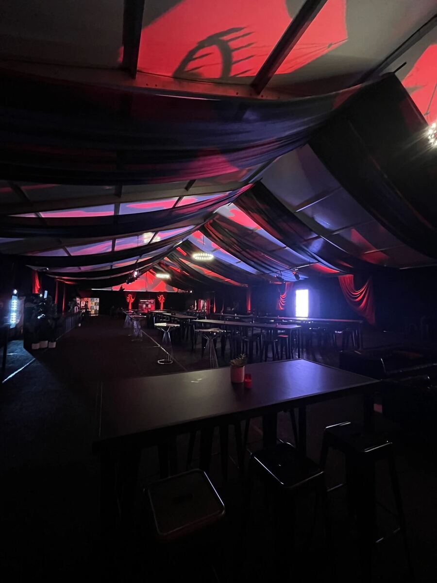 Moody lounge interior with stage lighting