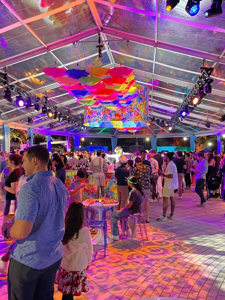Colorful tent party with crowd