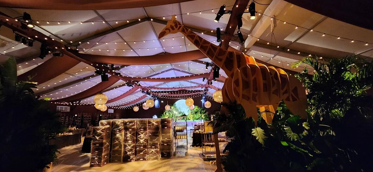 Rustic tent interior with string lighting