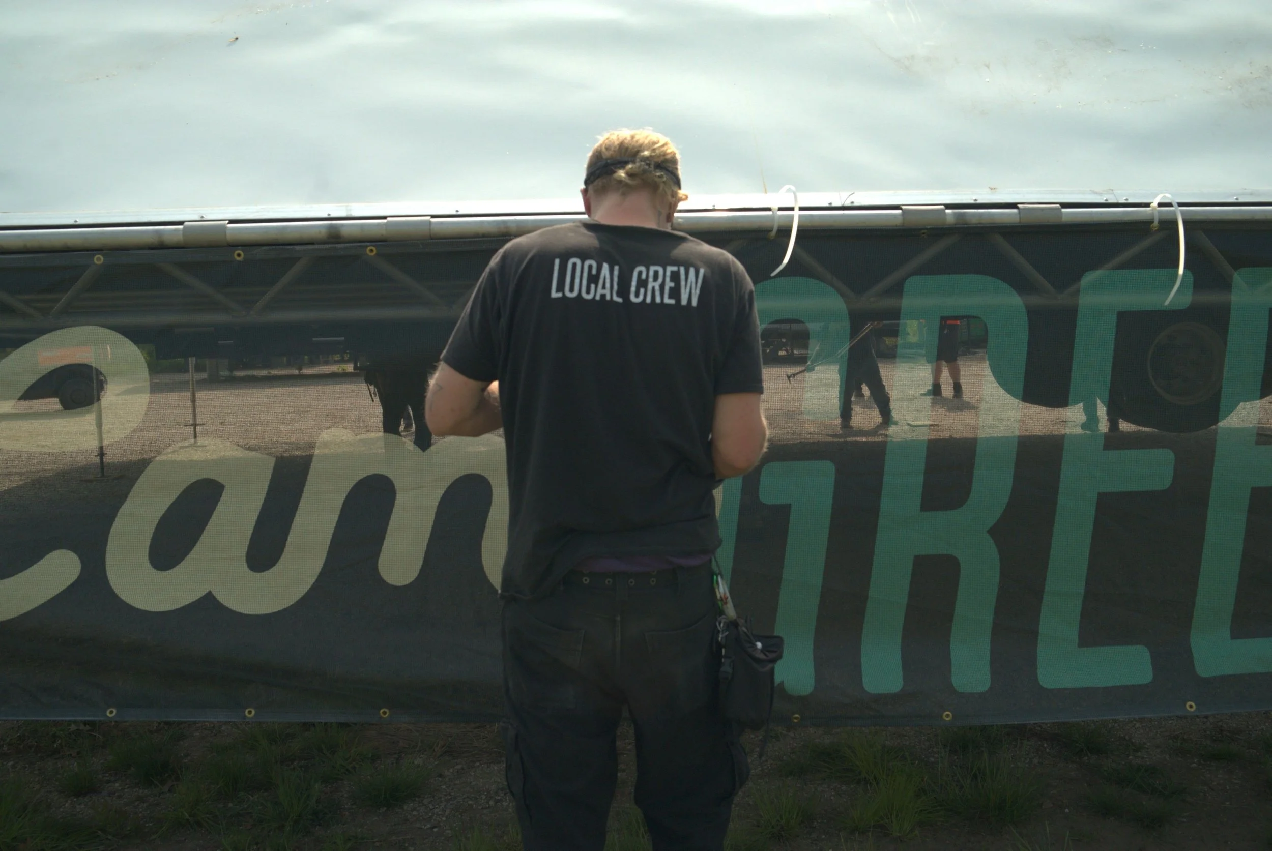 RISE crew member performing site operations outdoors